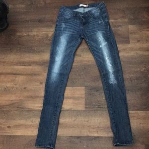 Distressed Stretch Skinny Jeans